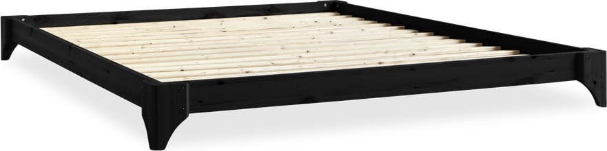 Černá dvoulůžková postel z borovicového dřeva s roštem