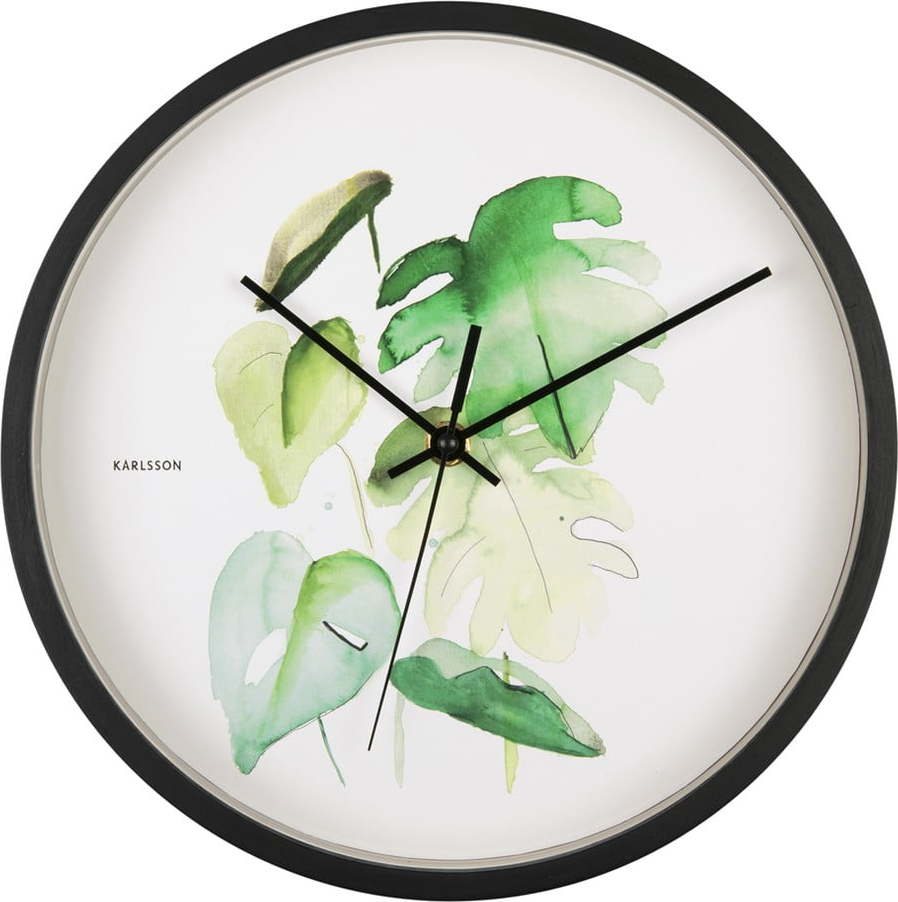 Zeleno-bílé nástěnné hodiny v černém rámu