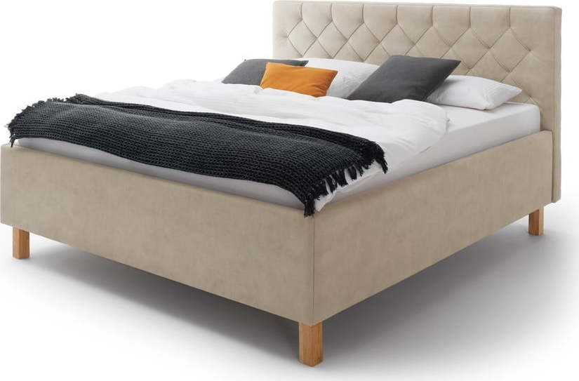 Béžová čalouněná dvoulůžková postel s úložným prostorem s roštem