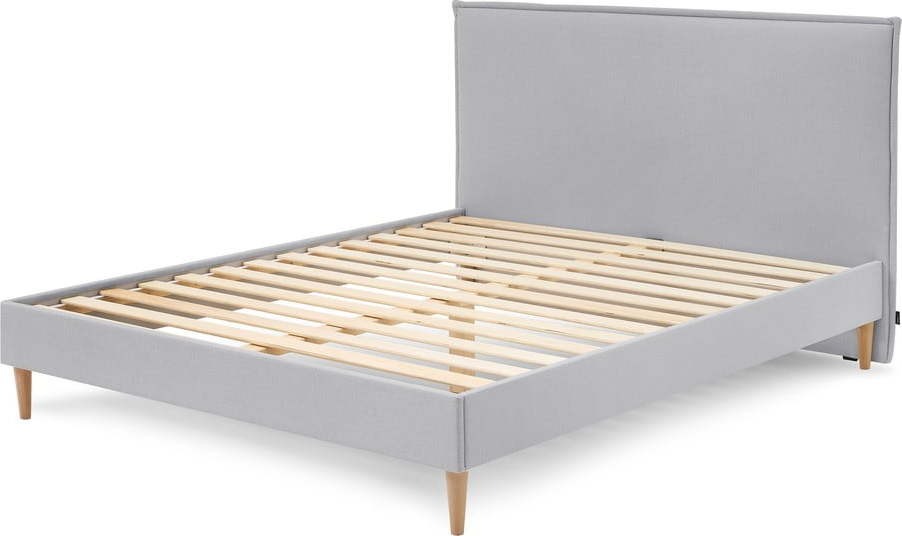 Světle šedá čalouněná dvoulůžková postel s roštem 180x200