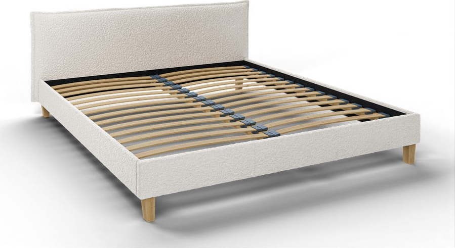 Krémová čalouněná dvoulůžková postel s roštem 180x200